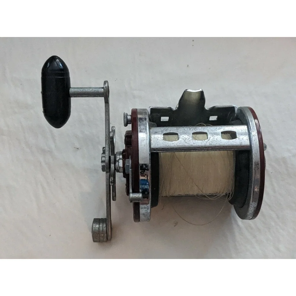 Penn Jigmaster 500 Fishing Reel Brown Sides Black Handle USA Working
